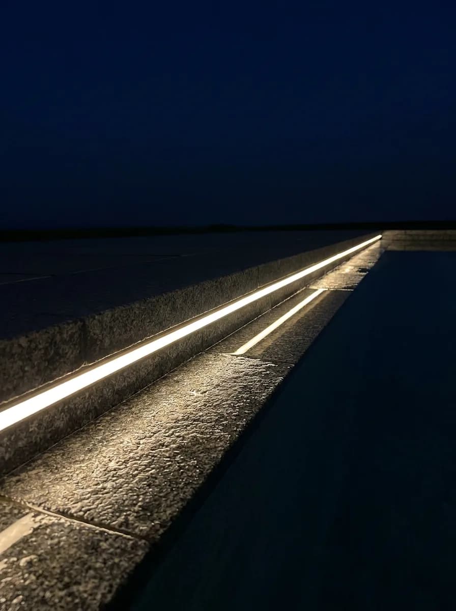 Step edge lighting at night — Orenara LED strip running beneath step nosings, casting warm wash